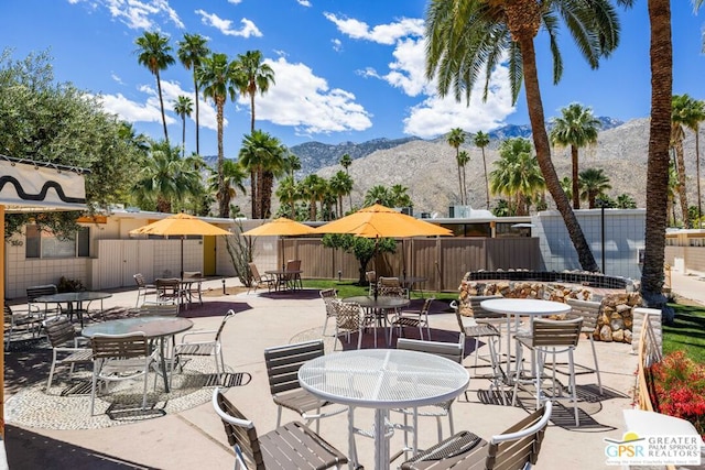 view of patio / terrace featuring a mountain view