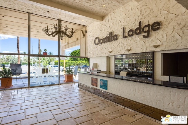 welcome area with an inviting chandelier