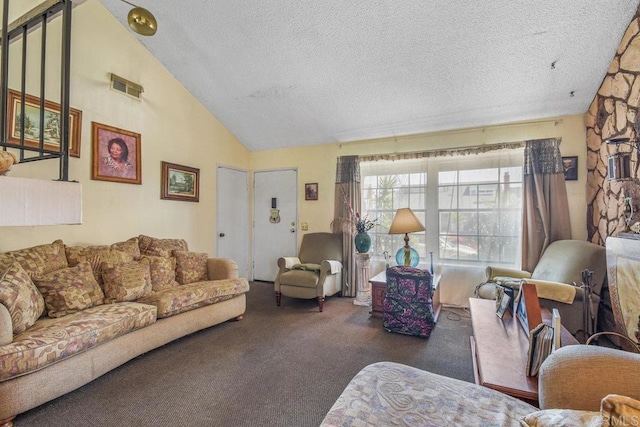 living room featuring lofted ceiling, a textured ceiling, visible vents, and carpet flooring