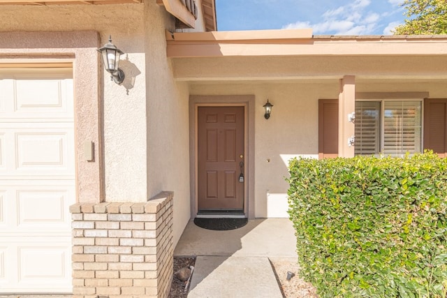 doorway to property featuring a porch