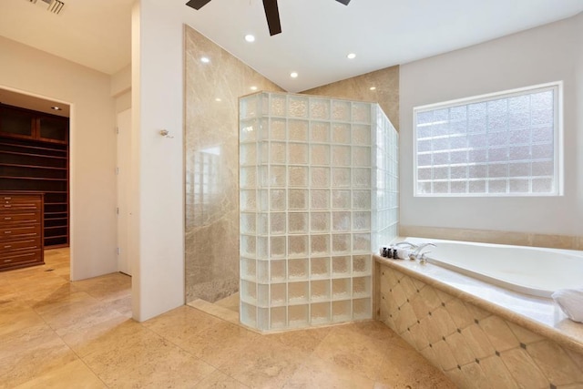 bathroom featuring separate shower and tub and ceiling fan