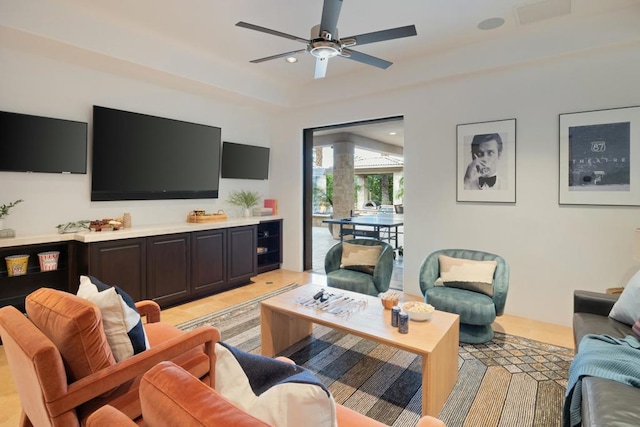 living room with ceiling fan