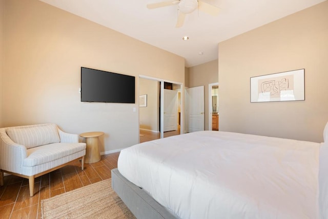 bedroom featuring light wood-type flooring and ceiling fan