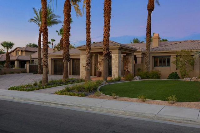 view of front of home featuring a yard