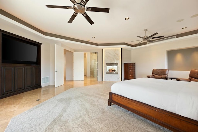 bedroom with ceiling fan and crown molding