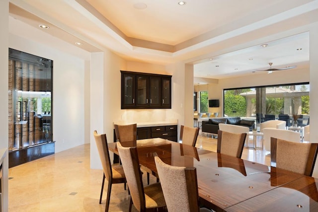 dining room featuring ceiling fan