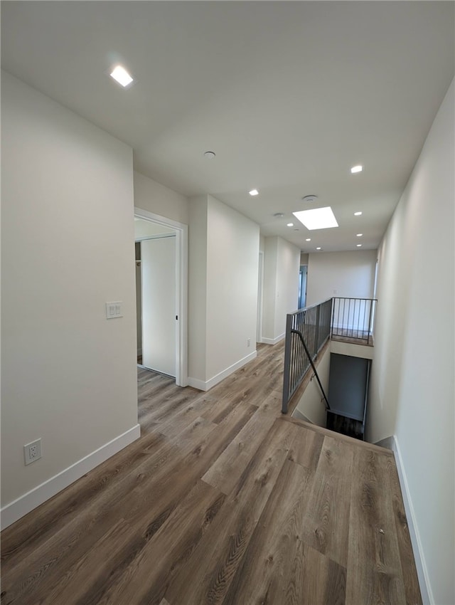 empty room with wood-type flooring