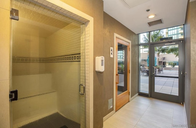 bathroom with tile patterned floors