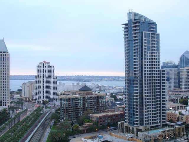 property's view of city with a water view