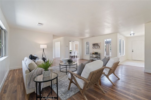 living room with dark wood-type flooring