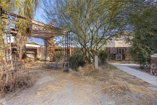 view of yard with a pergola