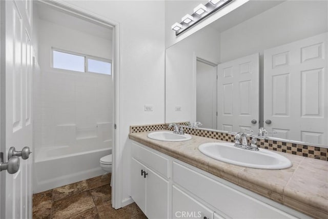 full bathroom featuring vanity, toilet, and shower / washtub combination