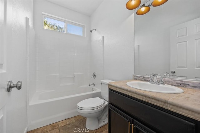 full bathroom with tile patterned flooring, bathtub / shower combination, vanity, and toilet