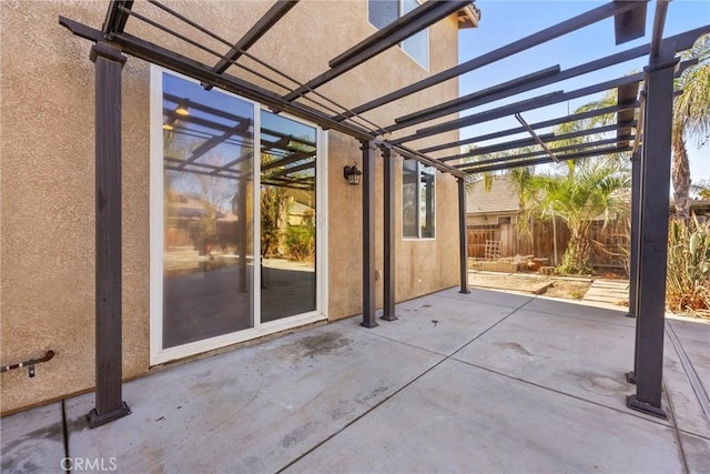 view of patio featuring a pergola