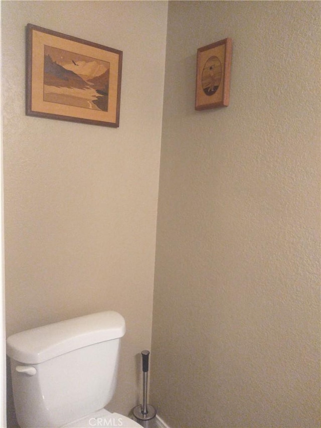 bathroom featuring toilet