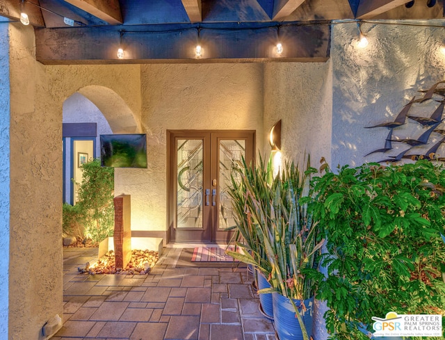 view of exterior entry with french doors