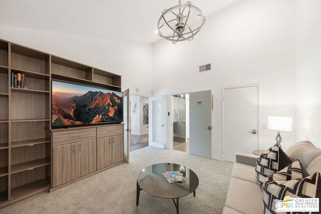 living room with light colored carpet and high vaulted ceiling