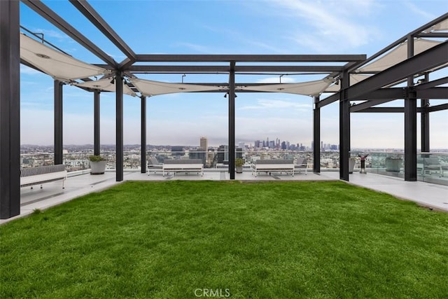 view of yard with a pergola and a patio area