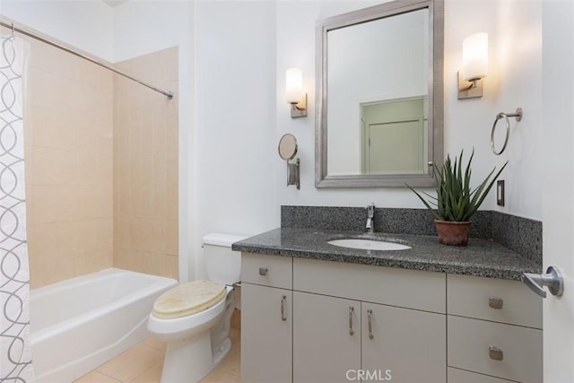 full bathroom featuring tile patterned floors, vanity, shower / bath combination with curtain, and toilet