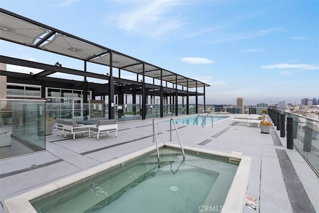 view of pool featuring a community hot tub