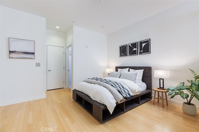 bedroom featuring hardwood / wood-style floors