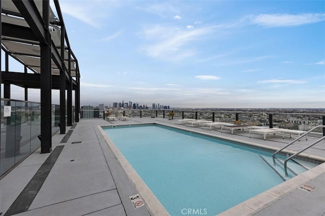 view of pool featuring a patio area