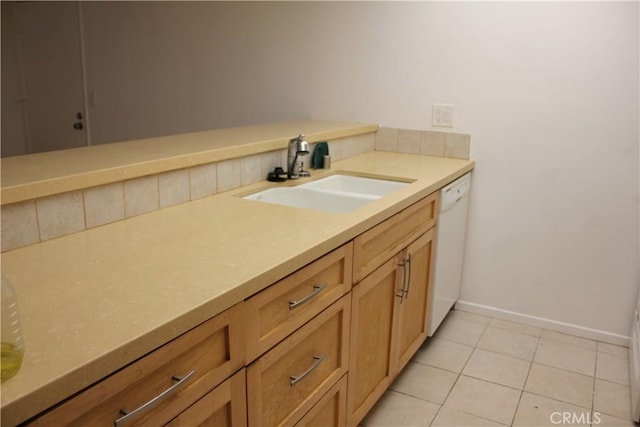 bathroom with tile patterned floors and sink