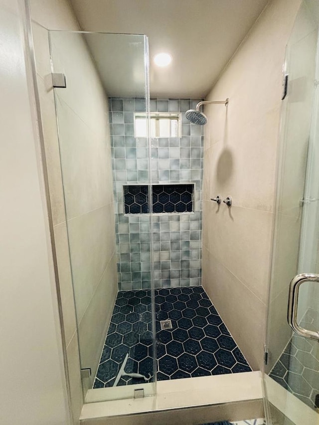 bathroom featuring walk in shower