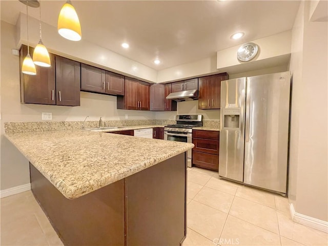 kitchen with kitchen peninsula, dark brown cabinets, hanging light fixtures, and appliances with stainless steel finishes