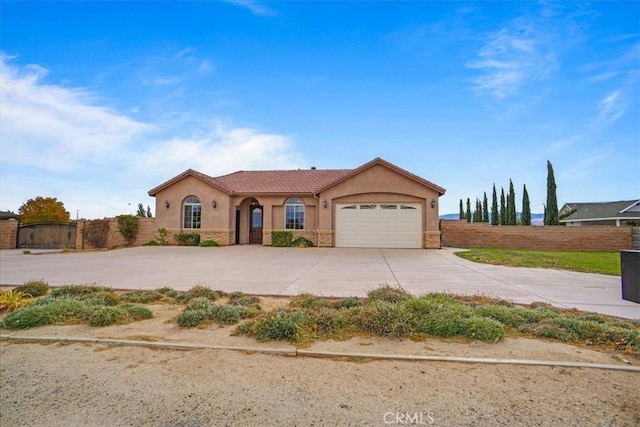 view of front of property with a garage