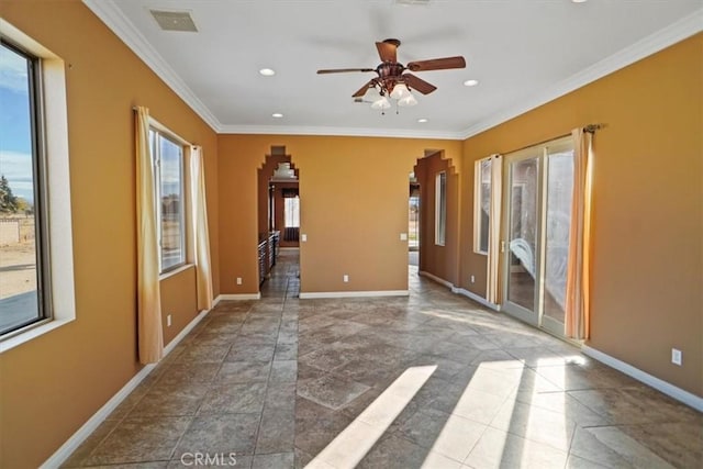 unfurnished room featuring crown molding and ceiling fan