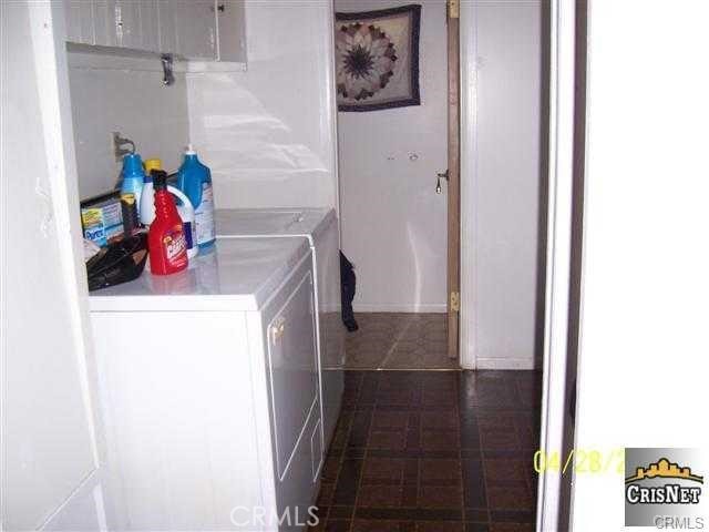 laundry area featuring laundry area and washer and dryer