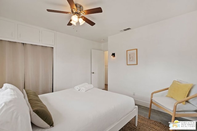 carpeted bedroom with ceiling fan