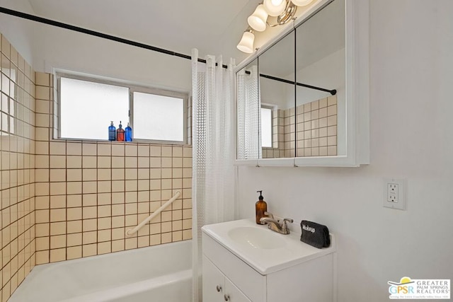 bathroom with vanity and shower / tub combo with curtain