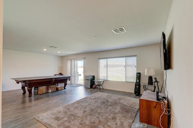 playroom with hardwood / wood-style flooring and billiards