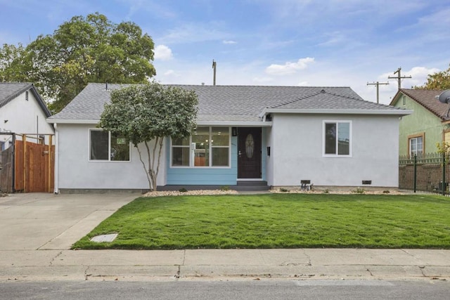 ranch-style home featuring a front lawn