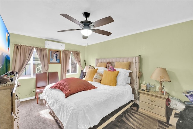 carpeted bedroom with ceiling fan, a wall mounted air conditioner, and crown molding