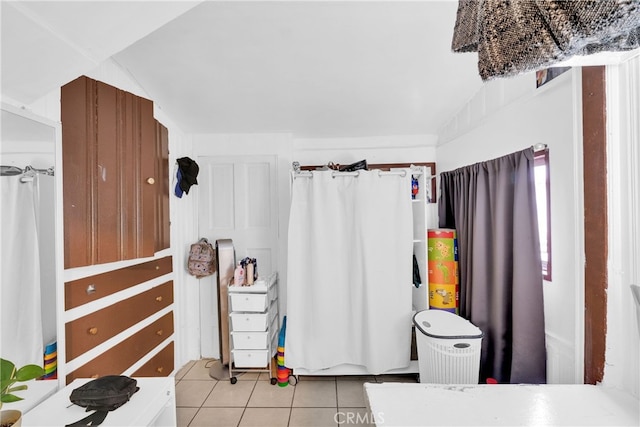 bathroom with tile patterned flooring