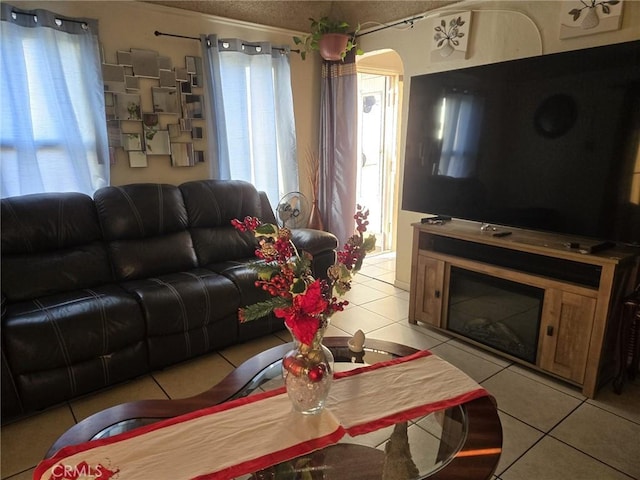 living room with light tile patterned floors