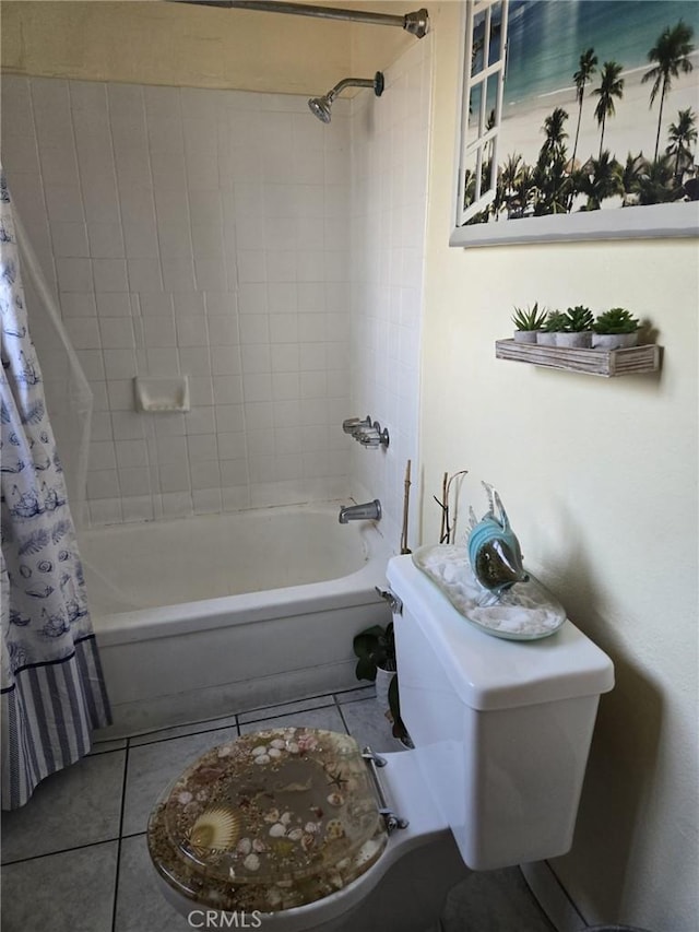 bathroom featuring toilet, tile patterned floors, and shower / tub combo with curtain