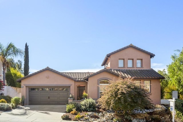 view of front of property with a garage