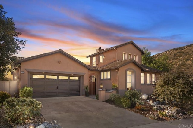 view of front of property with a garage