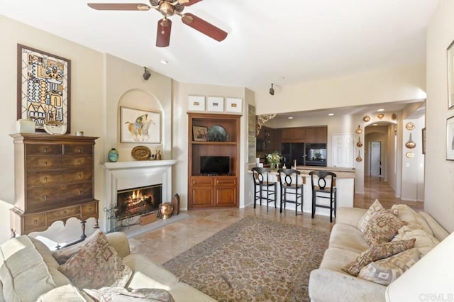 living room with ceiling fan