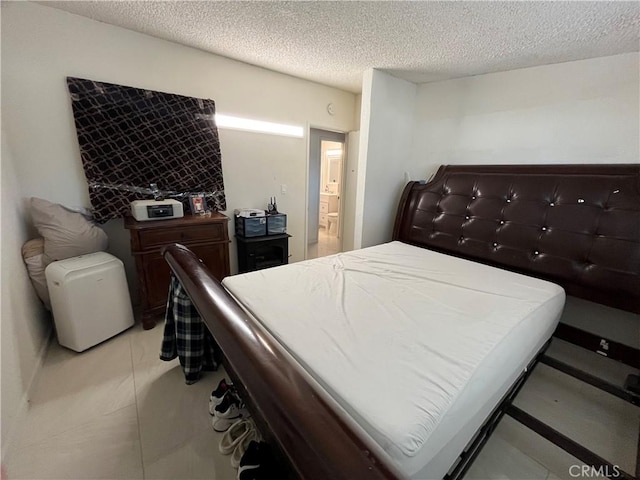 bedroom with a textured ceiling