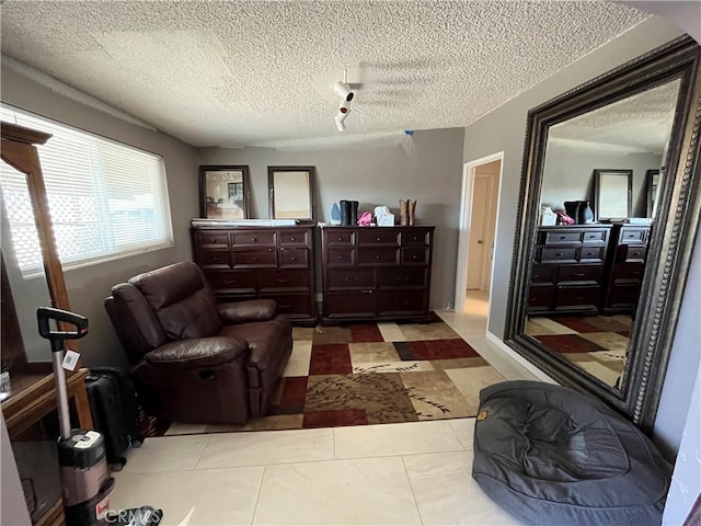 interior space with a textured ceiling