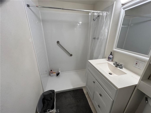 bathroom featuring vanity and a shower with curtain