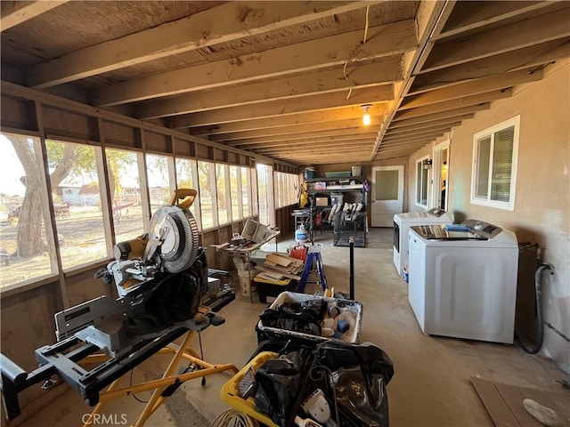 interior space with washer and clothes dryer