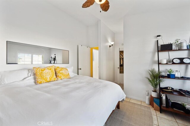 bedroom featuring ceiling fan and light tile patterned flooring