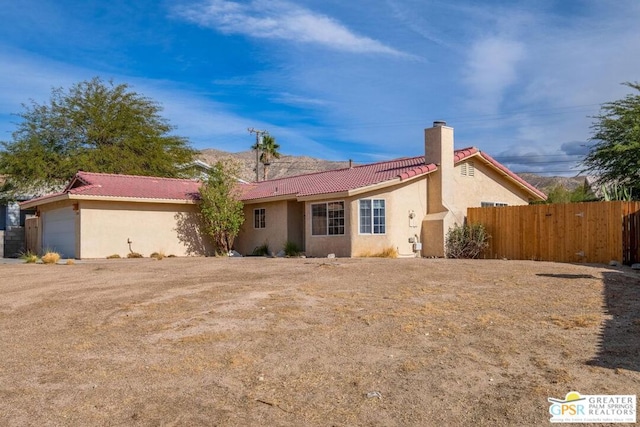 exterior space with a garage