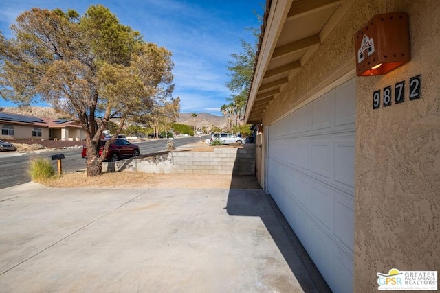 exterior space with a mountain view